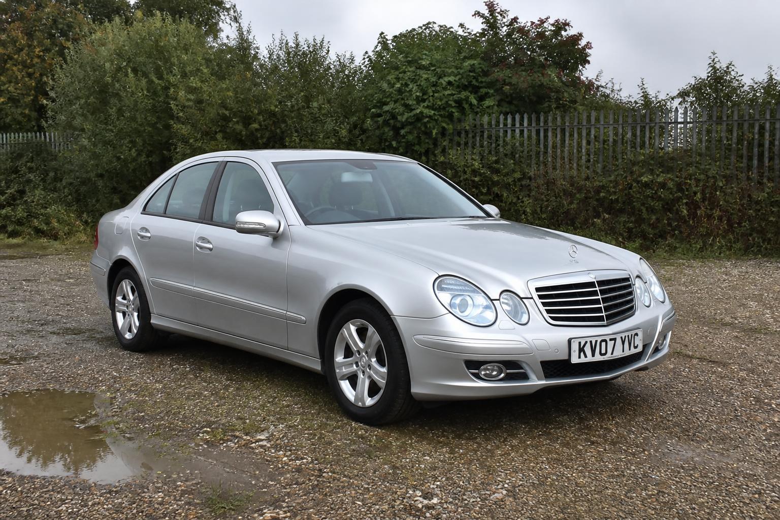 Mercedes-Benz E-Class photographed on a gravel forecourt